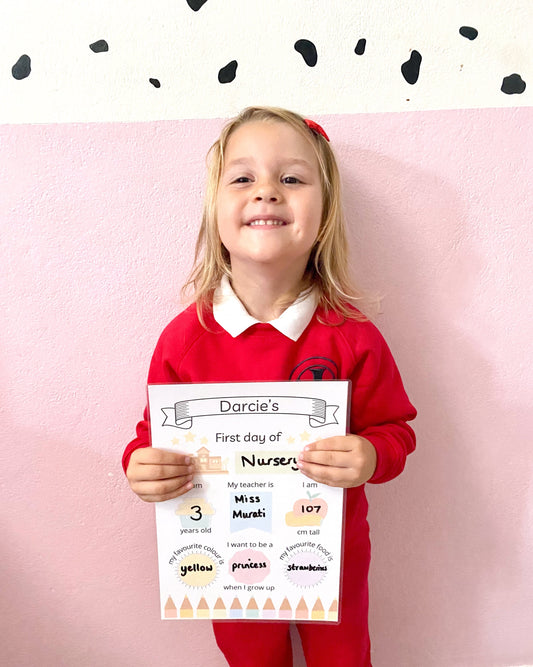 Child ready for their first day of reception with a Busby Busy Books first day of sign
