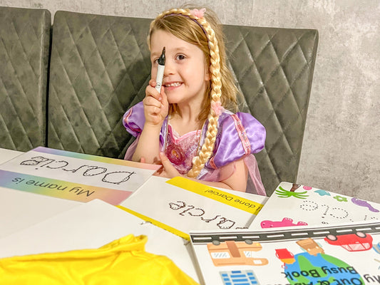 Child doing a screen-free learning activity at home during the summer holidays
