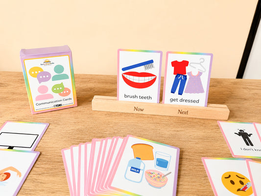 Now and next stand with communication flashcards showing a child's routine
